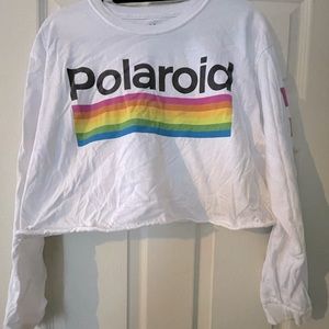 Long sleeve cropped shirt. White with multicolor Polaroid graphic.